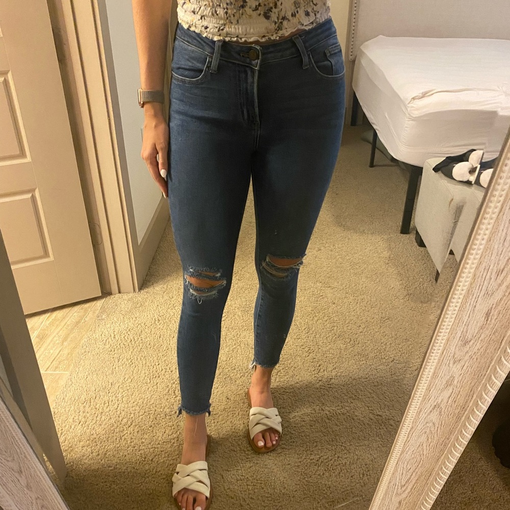 Mid-rise denim, ripped jeans.